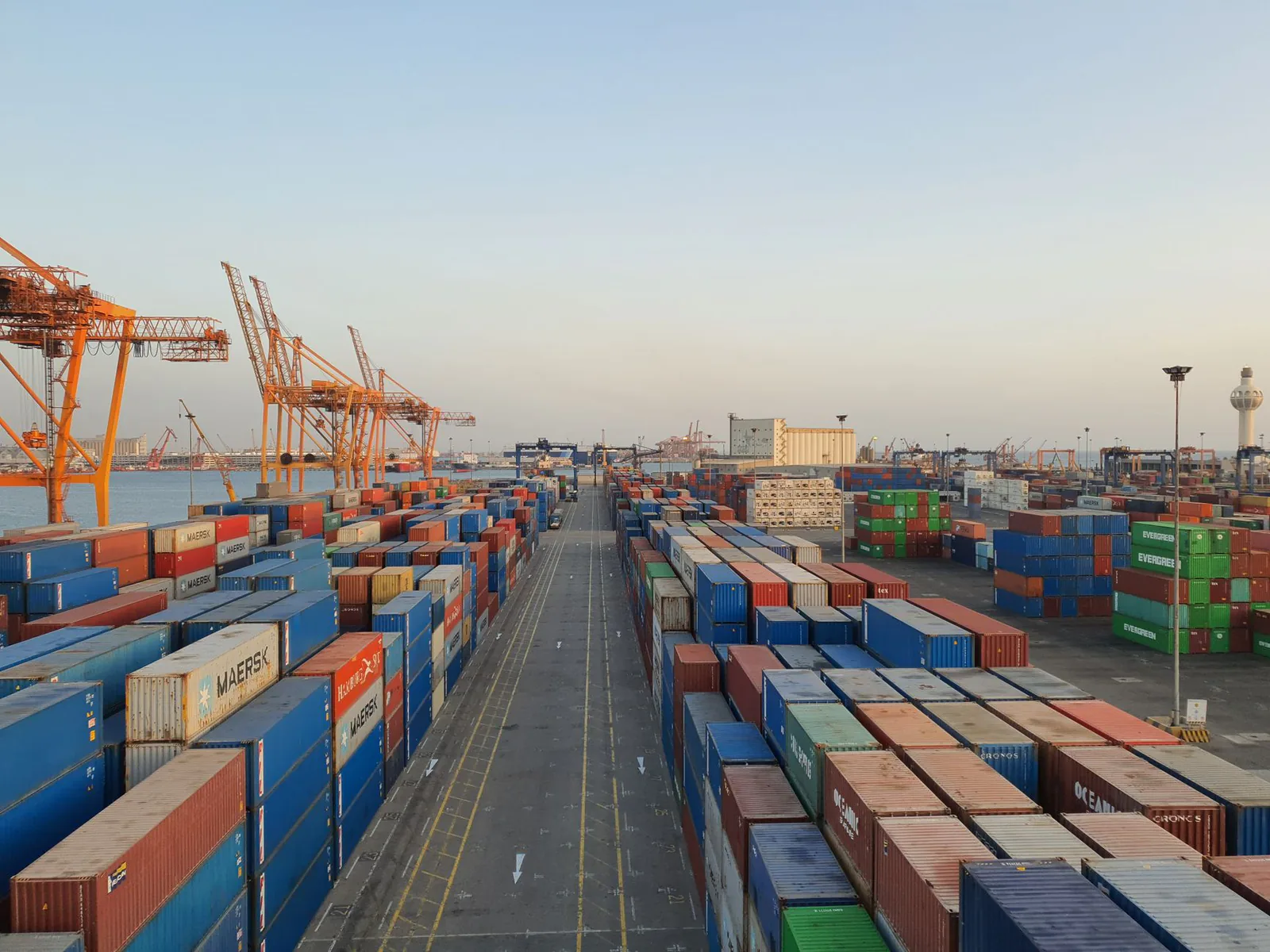 Cargo containers at a busy shipping port